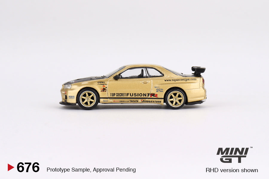 Mini GT 1/64 - Nissan Skyline GT-R (R34) Top Secret Top Secret Gold