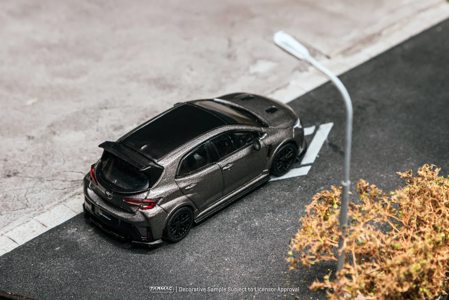Tarmac Works 1/64 - Toyota GGR Corolla Grey With Oil Can Packaging - GLOBAL64